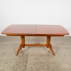 A Gordon & Russell Rosewood and Mahogany Extension Dining Table