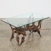 A Brutalist Iron And Glass Coffee Table