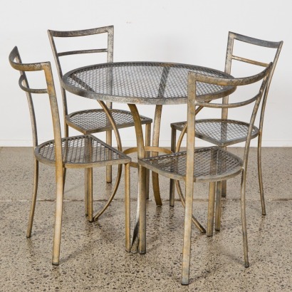 A Five Piece Outdoor Dining Set