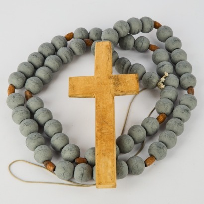 A Large Decorative Mexican Crusifix on and Oversized Rosary Bead Chain