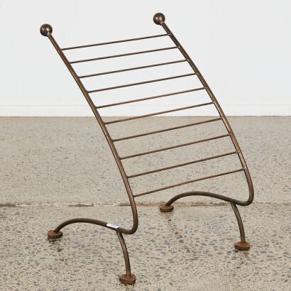 A Vintage Wrought Iron Magazine Rack