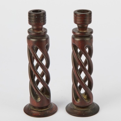 A Pair Of Twisted Wood Candle Holders