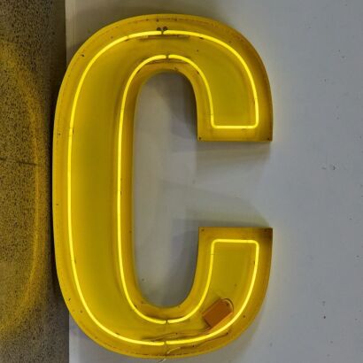 A Large Neon Capital C