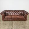 A Brown Leather Chesterfield Sofa