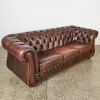 A Brown Leather Chesterfield Sofa - 2