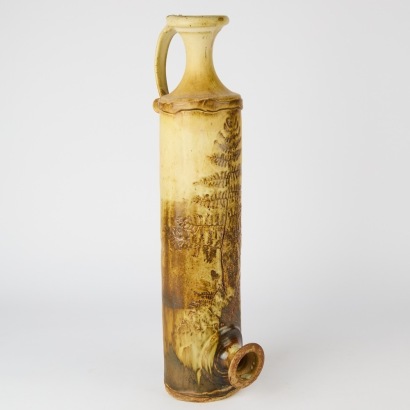 A Tall New Zealand Pottery Floor Vase With Fern Design