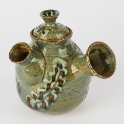 A Helen Mason Stoneware Teapot With Slip Trail Decoration