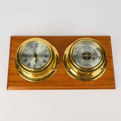 A Vintage Nautical Themed Brass Barometer And Wall Clock