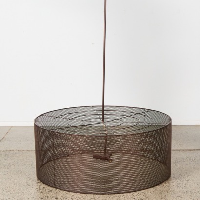 A Large Perforated Metal Pendant
