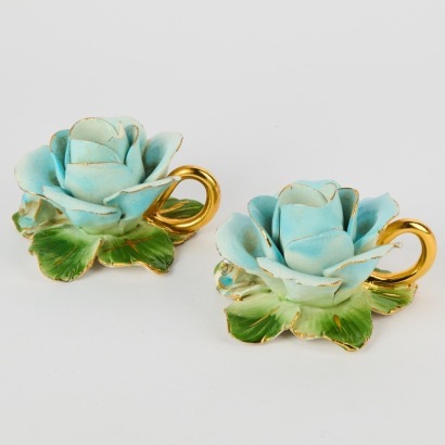 A Pair of Antique Rose Candle Holders