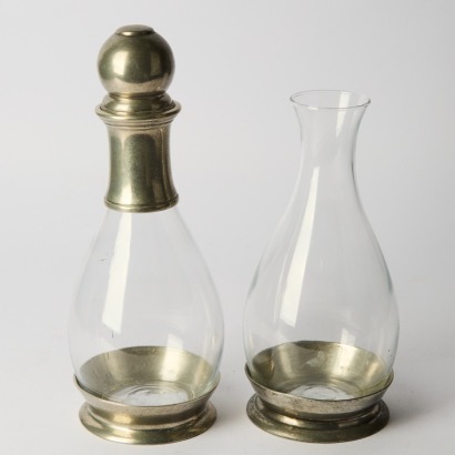 A Pair of Corso de Fiori Pewter and Glass Cruets
