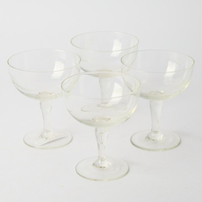 A Set Of Four Vintage Etched Champagne Coupes