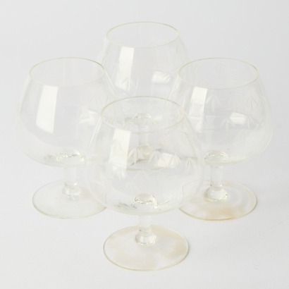 A Set Of Four Bamboo Etched Congac Glasses