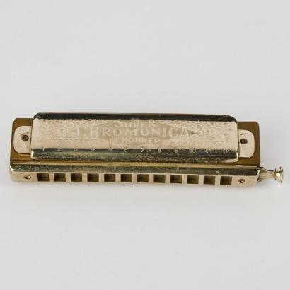 A Vintage Hohner Super Chromonica 12-Hole Harmonica in the Key of C