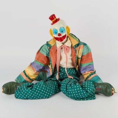 A Vintage Clown Doll with Hand-Painted Porcelain Head and Feet