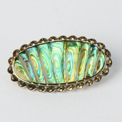 A Vintage Sterling Silver Peacock Tail Cut Paua Brooch