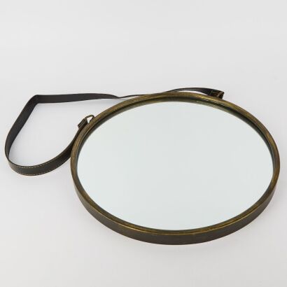 A Wall Hung Circular Mirror