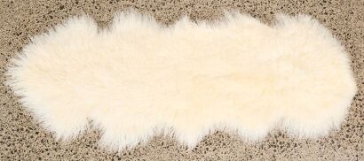 A Large Ivory Tibetan Lamb Rug