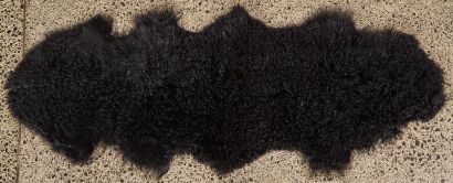 A Large Black Tibetan Lamb Rug