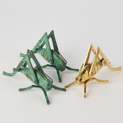A Trio of Brass Crickets