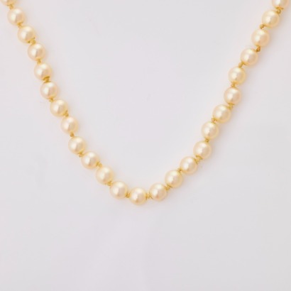 Atributed to Mikimoto, 52cm Single Strand of 5mm Cultured Pearls with Sterling Silver Clasp with Box
