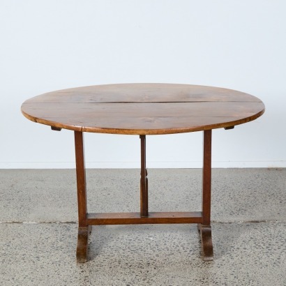 An Oval Oak Folding Table