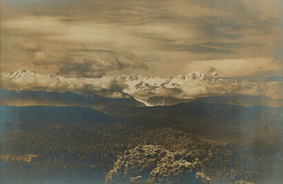 PHOTOGRAPHER UNKNOWN Southern Alps, With Franz Josef Glacier in Centre; Viewed from Okarito Station