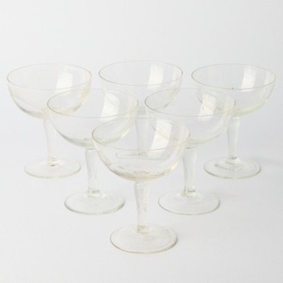A Set of Six Etched Champagne Coupes