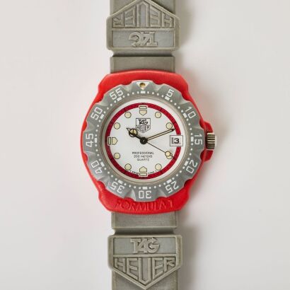 Grey Acrylic / Red Fibreglass Resin, 35mm TAG Heuer Formula 1 - Series 1, Marlboro McLaren Team Wristwatch, issued between 1986-1989