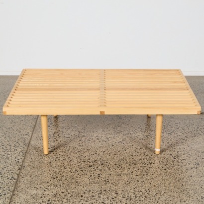 A Natural Wood Slat Bench