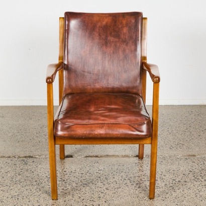 A Mid-Century Mahogany and Vinyl Fireside Chair
