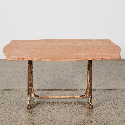 A Rustic Marble Topped Outdoor Table