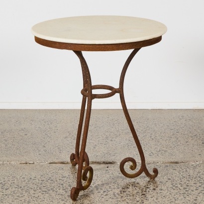 A Rustic Wine Table With Marble Top