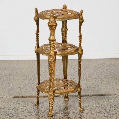 A Cast Three Tiered Table by Model Depositato Italy