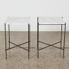 A Pair of Marble and Steel Bedside Tables
