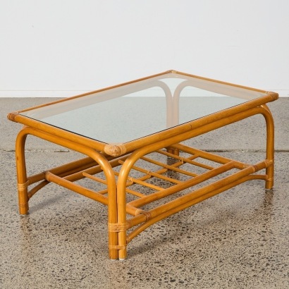 A Cane Coffee Table With Glass Top