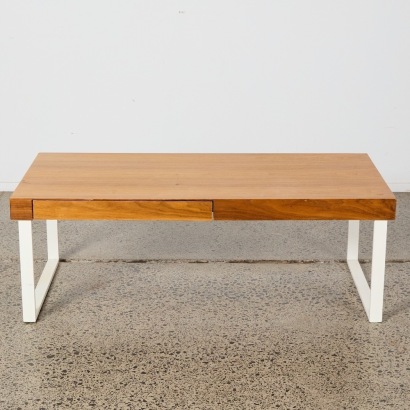 A Minimal Sleigh Based Coffee Table With Wooden Top