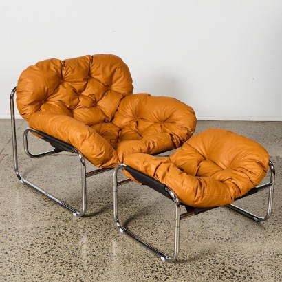 A Contemporary Occasional Chair with Footstool