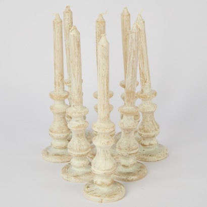 A Set of Eight Small Wax Moulded Candles