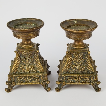 A Pair of Antique Copper Look Candle Holders