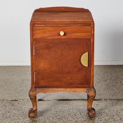 An Antique Wooden Bedside Table With Claw Feet And Contempory Fixings