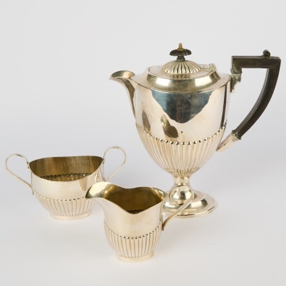 A Neoclassical Fluted Teapot Milk Jug and Sugar Bowl by William Hutton & Sons Silver Plate