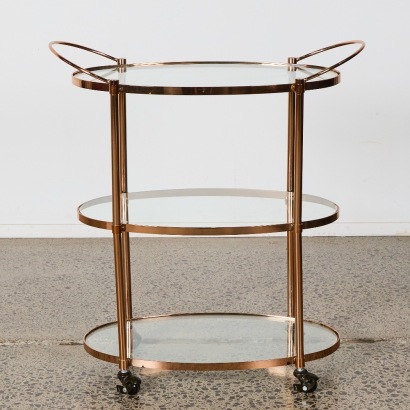 A Rose Gold and Glass Bar Trolley