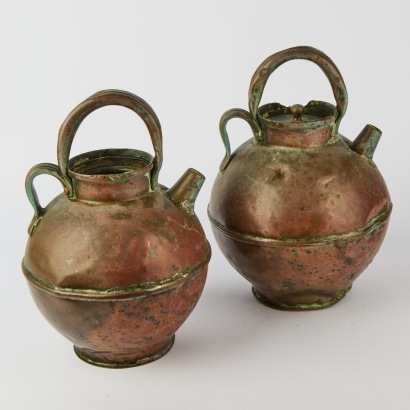 A Pair of Antique Copper Jugs