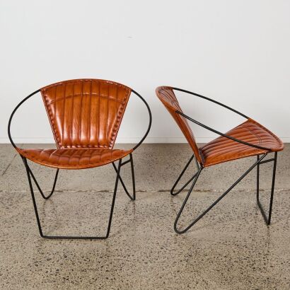 A Pair of Contemporary MCM Style Leather Occasional Chairs