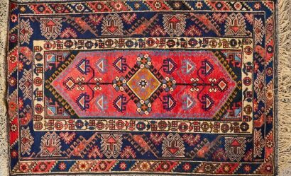 A Vintage Hand-Knotted Persian Rug