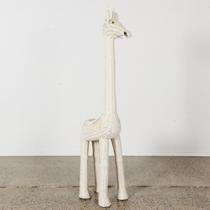 A Large Wicker Giraffe Plant Stand