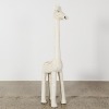 A Large Wicker Giraffe Plant Stand