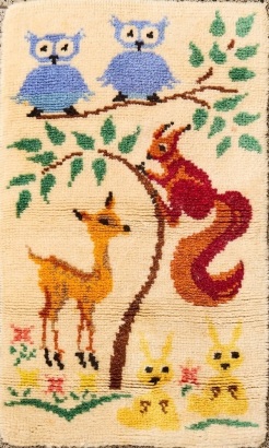 A Vintage Animal Themed Woollen Rug