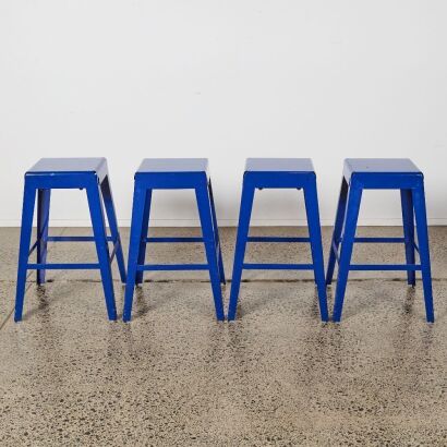 A Set of Four Industrial Metal Barstools